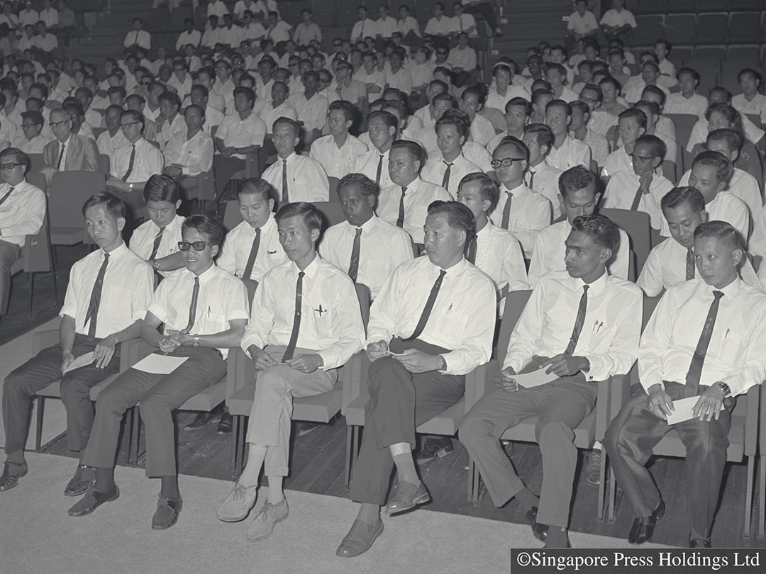 The 'graduation' ceremony of the first batch of 427 redundant civilian workers from British military bases who underwent a retraining programme, 1968.
