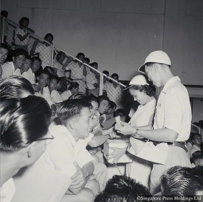 These two members of the Singapore Factory and Shop Workers' Union were busy collecting money for the union's strike fund in 1955.