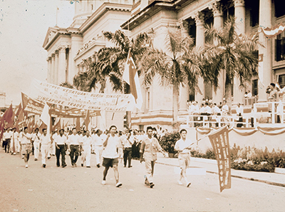 Singapore Trades Union Congress members during a march-past at Singapore’s National Day Parade on 3 June 1961.