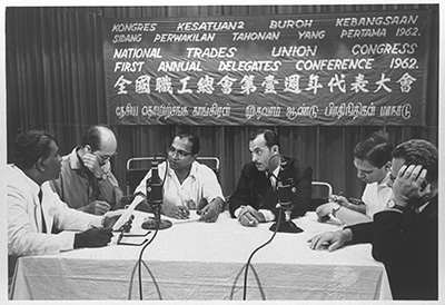 NTUC General Secretary* CV Devan Nair speaking to reporters at the NTUC’s First Annual Delegates Conference held at the Cultural Centre on Fort Canning, September 1962.